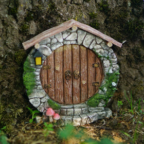 Top Collection miniature fairy garden detail with tiny figures and lush textures