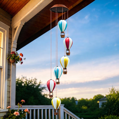 Topstor Hot Air Balloon Wind Chime stripe glows softly at night, enhancing outdoor spaces.