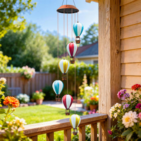 Topstor outdoor wind chime lights up after sun, creating garden ambience.