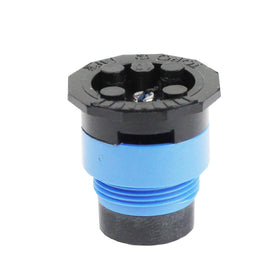 Toro nozzle kit in blue installed across a landscaped area