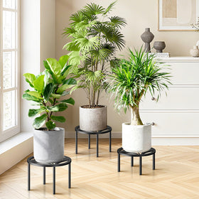 TOSKING black round plant stand with anti-rust finish withstands outdoor weather.