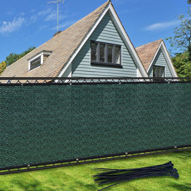 TOTU privacy screen fence in green enhances backyard privacy and visual appeal.