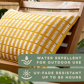 Alara pillow outdoors on a patio demonstrates UV fade resistance.