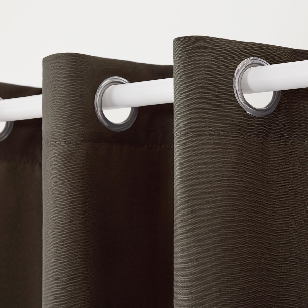 Town and Country Basics Cabana curtains draped for a cozy, light-filtered look.