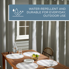 Town & Country Basics Cabana curtains in medium grey complement exterior decor.