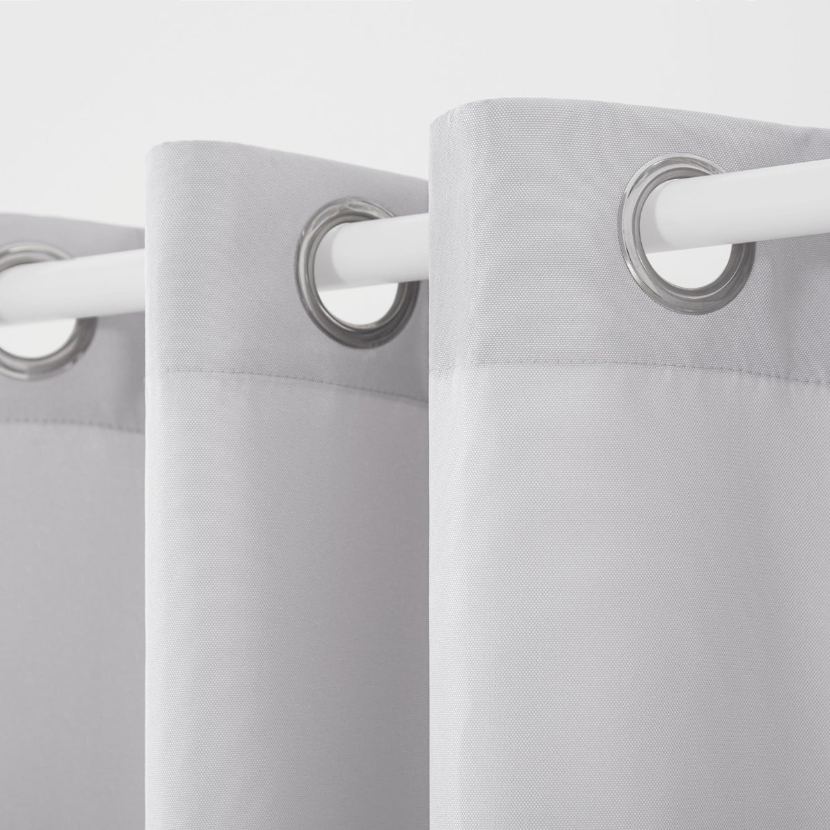 Town and Country Basics Cabana curtain on a rod with rust-proof grommets