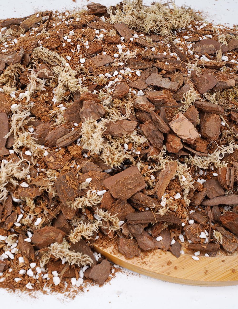 TOYPOPOR orchid mix ingredients visible: pine bark, perlite, moss for aeration.
