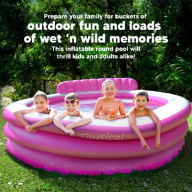 Toysical round lounge pool kids playing scene demonstrates spacious design.