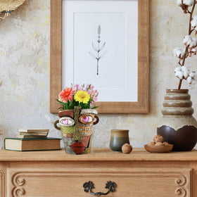 TOZLU hand-painted artistic planter brings character to shelves and tabletops.