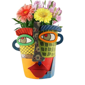 TOZLU Picasso brutalist face pot front view, vibrant indoor decor