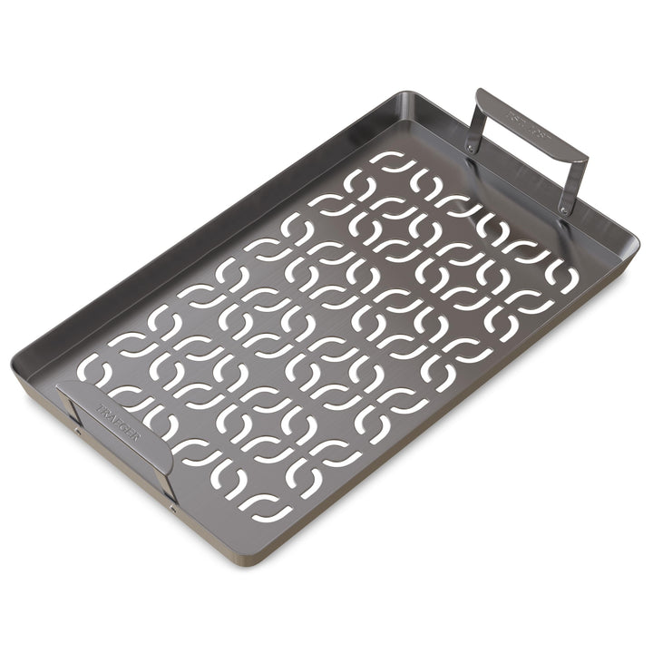 Traeger ModiFIRE fish-veggie tray on grill prevents food loss and promotes even cooking.