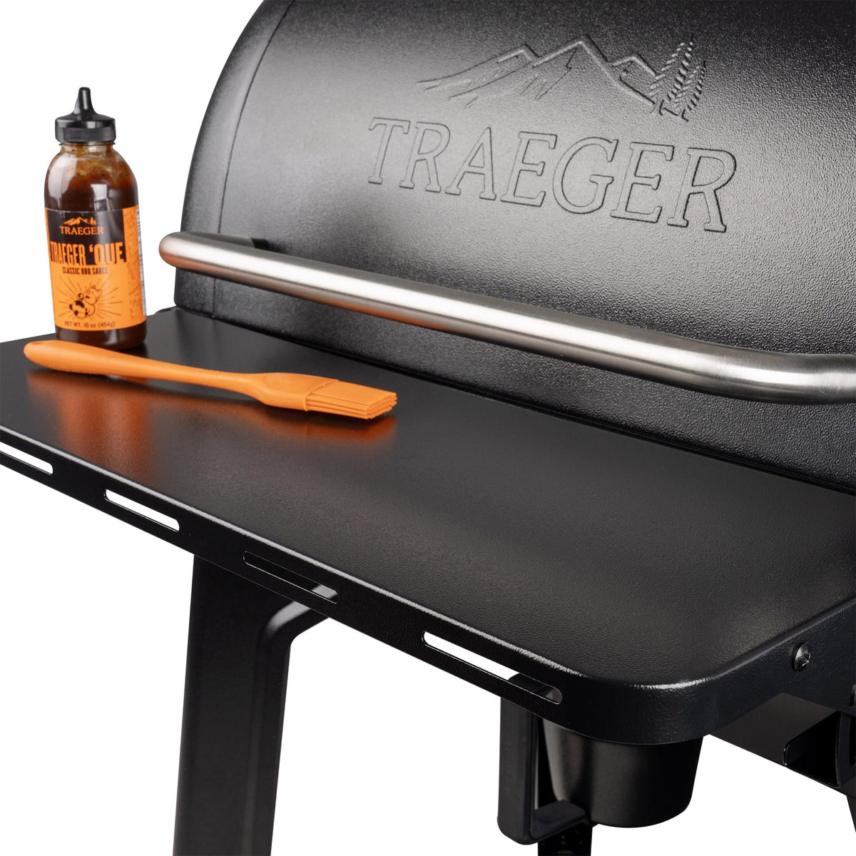 Traeger P A L Front Shelf mounted on a Woodridge grill for convenient prep area