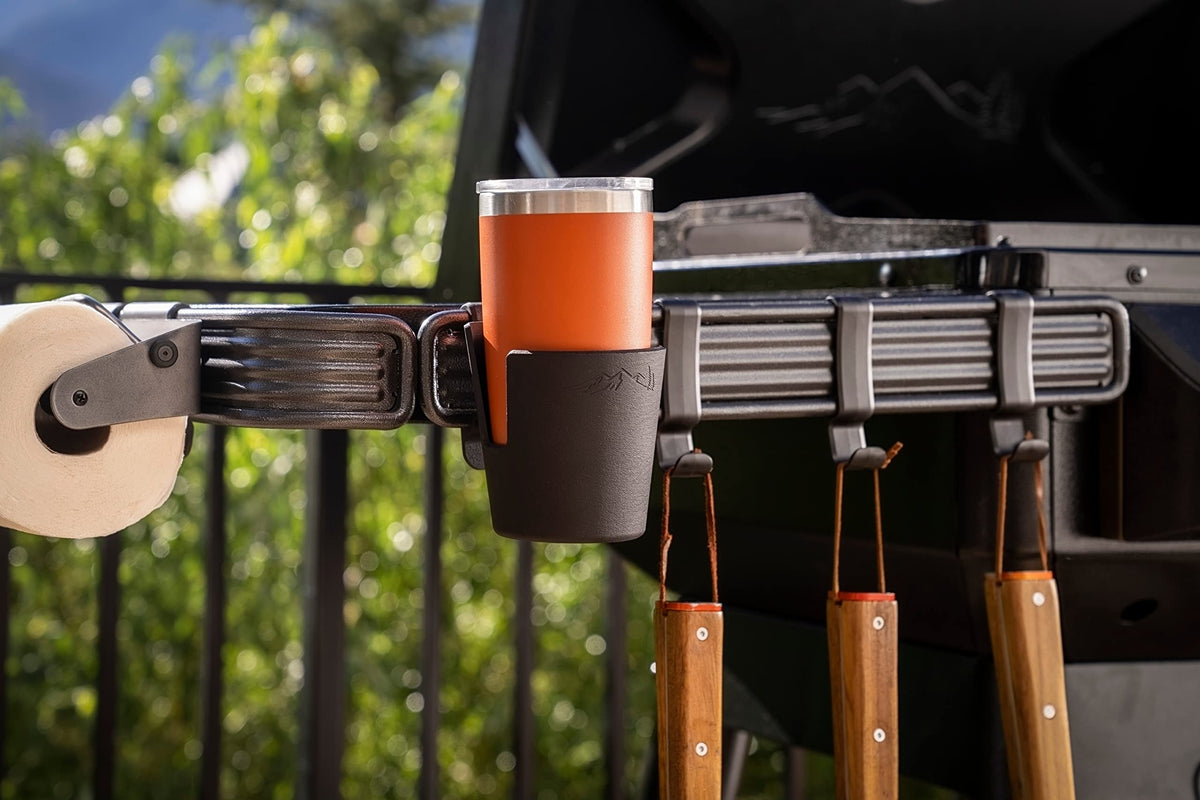 Traeger P.A.L. rail with cup holder in action beside the grill