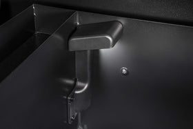 Hopper-mounted design keeps pellets visible and refills simple.