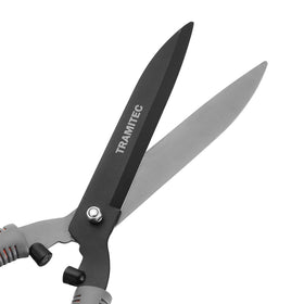 TRAMITEC high-carbon steel blades stay sharp for shaping shrubs.