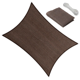 TRANSONA 10x12 brown shade sail over a patio providing cool shade and airflow
