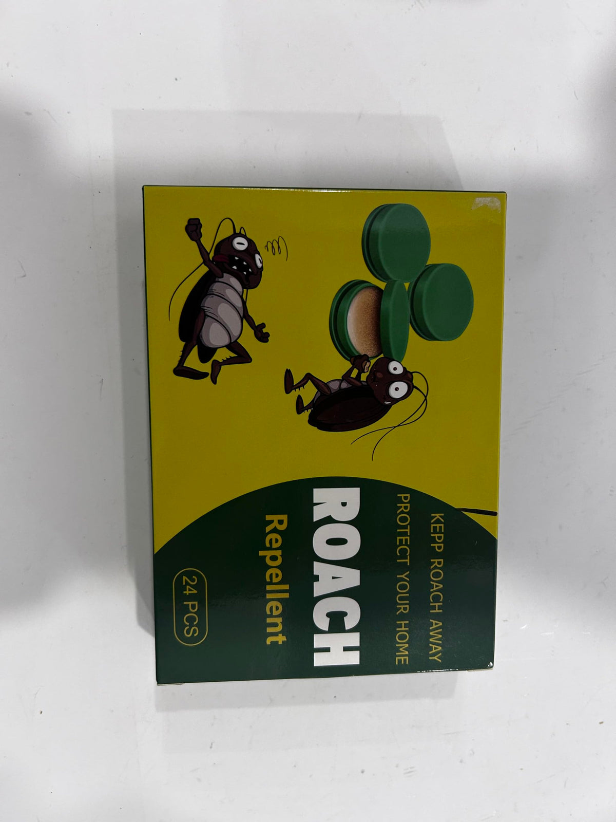 Trihood roach bait traps mounted in cabinet showing quick installation
