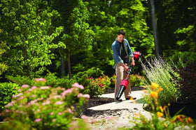 Lightweight CB720 design enables easy maneuvering around obstacles during yard work.
