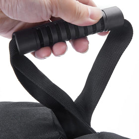 TRINKA weight bags wrapped around a leg with hook-and-loop straps.