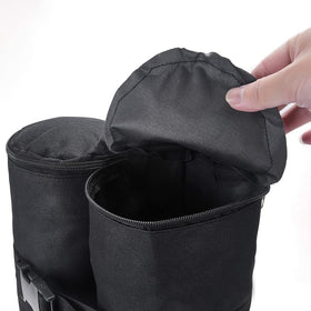 TRINKA bags filled with sand stabilizing a pop-up canopy outdoors.