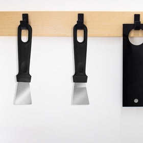 Trinkrittey griddle scraper in action; easy cleanup after grilling