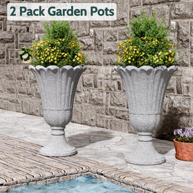 Drainage holes with removable stopper for adjustable moisture control.