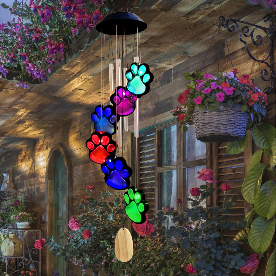 TSIPEKLO Paw Print wind chime with solar lights brightens outdoor evenings.