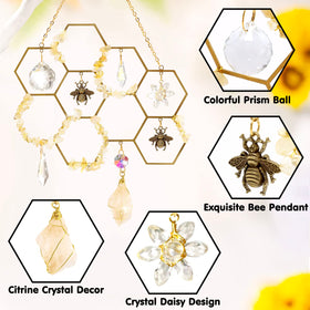 Tuitessine honeycomb crystal suncatcher with citrine crystals adds warm sparkle.