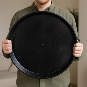 Tulpeed 14in round saucer blends with decor while protecting surfaces