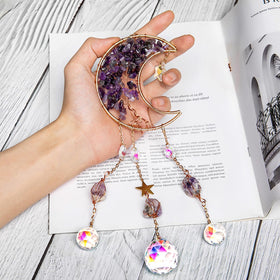 TUOKING Tree of Life crystal wind chimes in a garden setting.