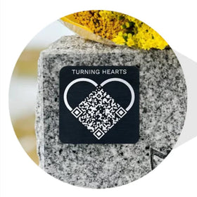 Turning Hearts QR memorial medallion front view links lasting memories to a personal tribute page