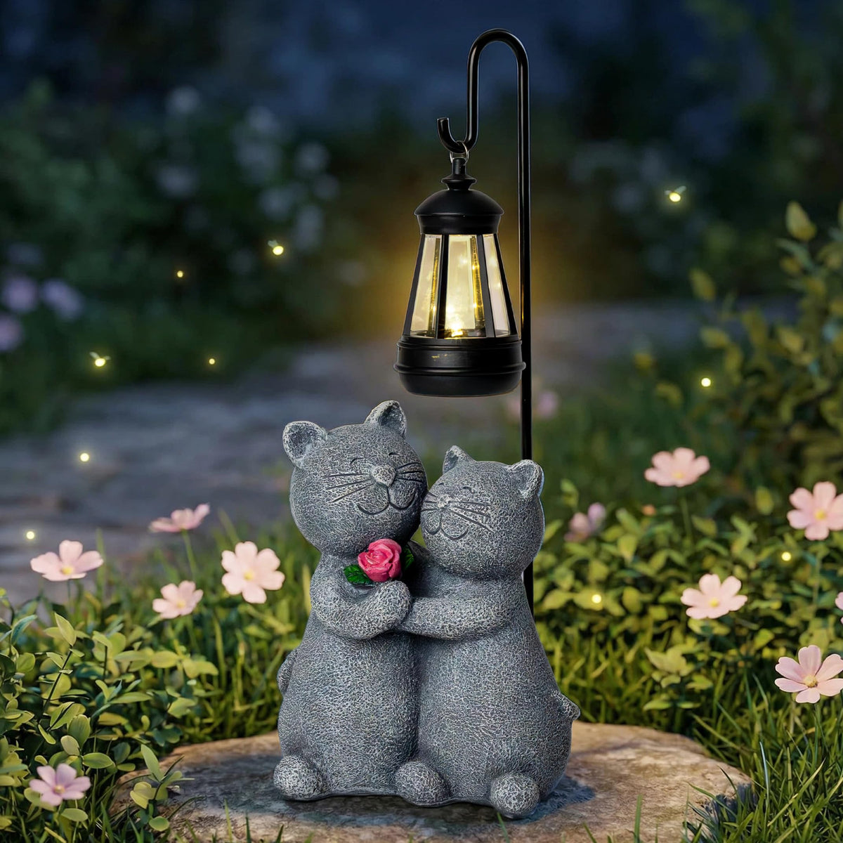 Twinbling outdoor cat garden statue with solar lantern lights your yard at dusk.