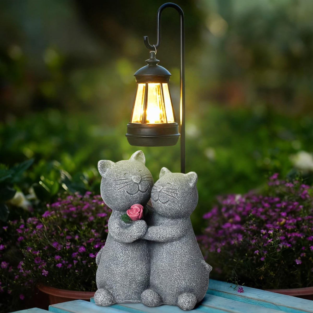 Twinbling patio cat figurine brightens porches with eco-friendly lighting.