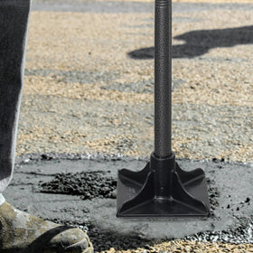 TwinkleTool tamper with 62-inch adjustable handle in use for easy ground leveling