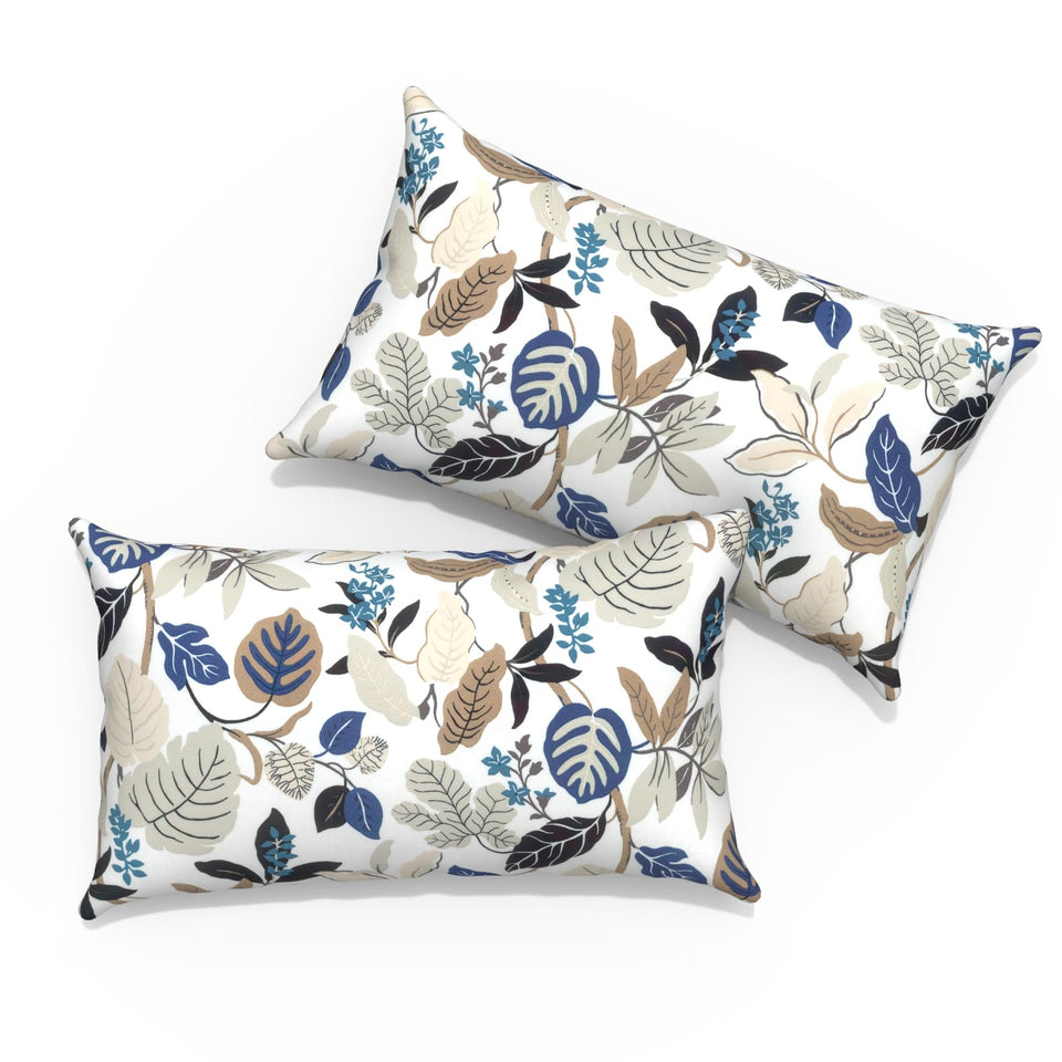 TWLEAR Breeze Leaves Beige outdoor lumbar pillow on a patio chair for all-season comfort