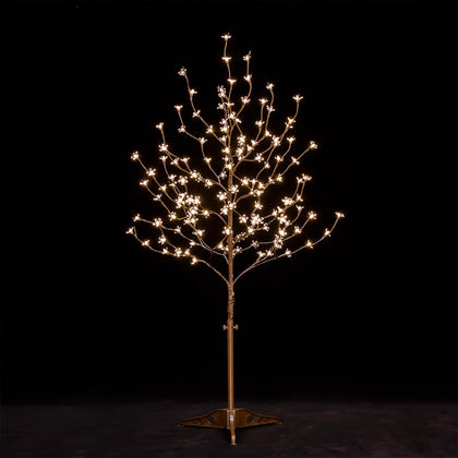 TYBEEU 4ft cherry blossom tree glowing with warm LEDs for versatile decor.