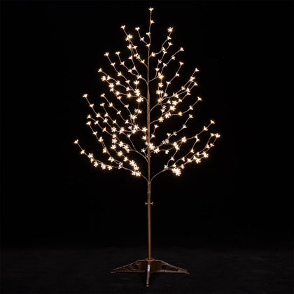 TYBEEU 5ft lighted cherry blossom tree adding warm ambience to a room