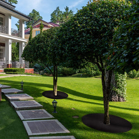 UCandy durable mulch ring blends with the landscape while reducing weeds.