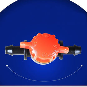 UCLEVER red-handle valve close-up highlighting simple adjustment and off position for efficient watering.