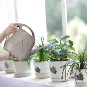 UFANME long-spout design helps reach tight plant rows.