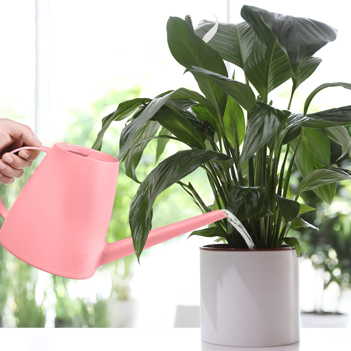 UFANME compact watering can easy to store and transport.