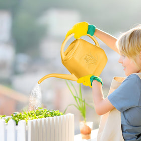 UFANME orange watering can closeup showing vibrant color and durable finish
