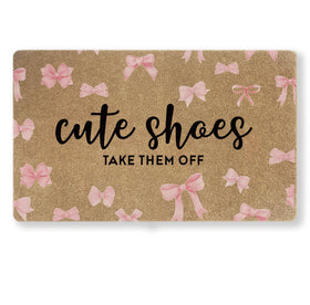 Uilatyu pink bow doormat 30x17 showing durable faux coir and welcoming design.