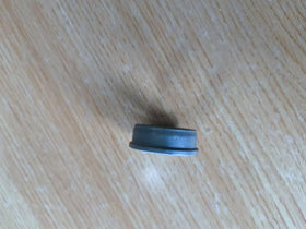 Uiuaquas riding mower spacer in use within wheel assembly.