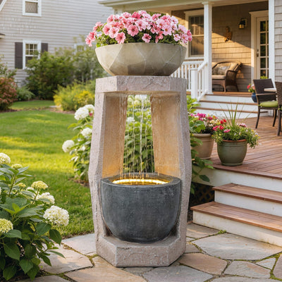 Ultym 32-inch fountain with hexagonal openwork columns creates a striking outdoor focal point.