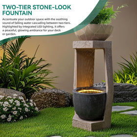 Ultym fountain shows vertical cascading water from top to bottom basins for a calming ambience.