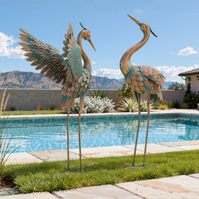 Ultym crane garden statue with ground stake enhances outdoor entry and lawn presence.