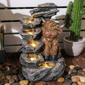 Ultym Highland Cow fountain front view showing rustic charm for garden focal point