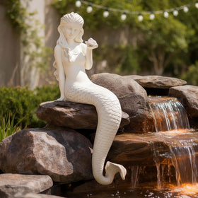 Ultym mermaid garden sculpture with flowing hair enhances ponds and patios.