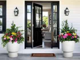 Ultym white terrazzo finish on a tall urn-style planter